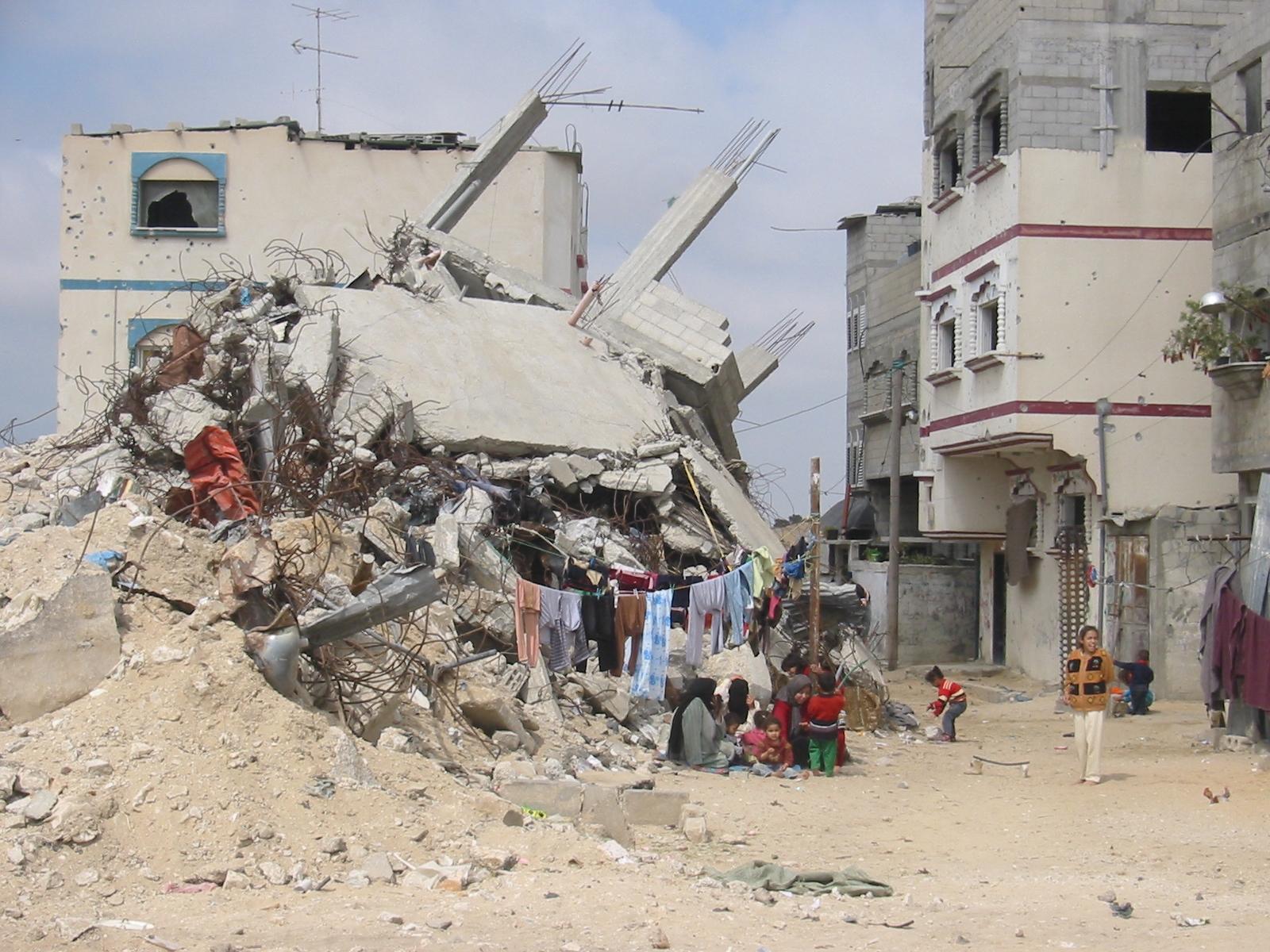 Building lies destroyed due to “cleaning” for the wall